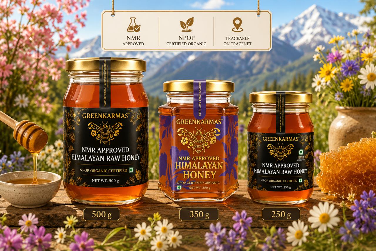 Three jars of Greenkarmas NMR Approved Himalayan Raw Honey displayed on a rustic wooden table with a honey dipper, flowers, and a mountain backdrop. A banner above highlights NMR Approved, NOP Certified Organic, and Traceable on Tractnet features.